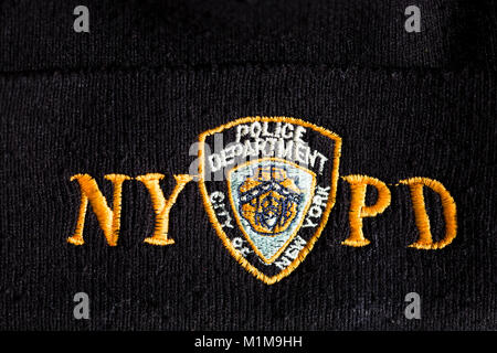 Badge NYPD su 'beanie' hat. Foto Stock
