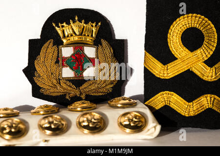 BP ufficiali cap badge, epaulettes e uniforme di pulsanti. BP della nave (1970s). BP petroliera flotta. Foto Stock