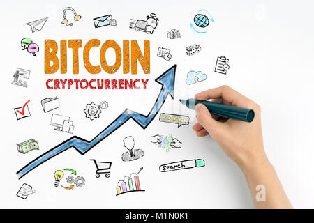 Bitcoin Cryptocurrency concetto. Mano con la scritta in pennarello Foto Stock