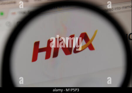 HNA Group Co. logo che si vede attraverso una lente di ingrandimento Foto Stock