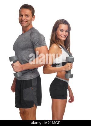 Coppia sportiva con manubri. Foto Stock