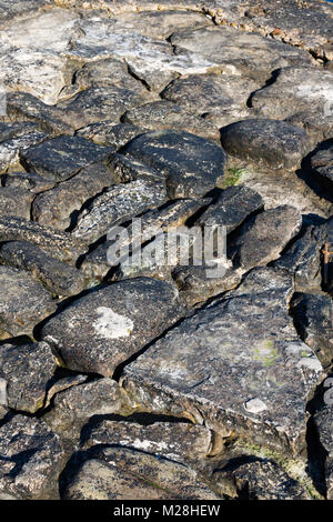 Swanage Dorset Inghilterra 17 aprile 2016 antica pietra di uno scalo con pietra grezza Foto Stock