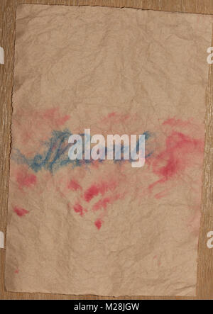 Carta kraft con un vago iscrizione in inchiostro su Marzo 8 Foto Stock