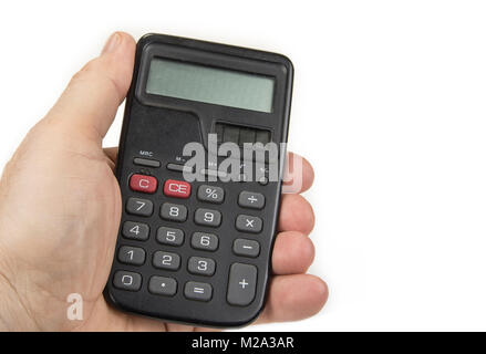 Piccola calcolatrice con numeri grandi in mano sul bianco Foto Stock