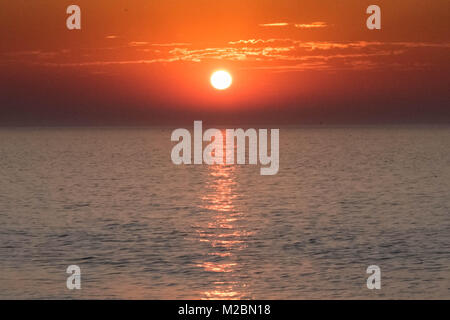 Tramonto a Heacham Beach, NORFOLK REGNO UNITO Foto Stock