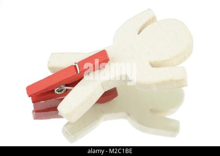 Maschio di legno con red clothespin tra le gambe Foto Stock