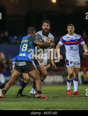 Craig Huby di Wakefield Trinity è affrontato da Ben Nakubuwai di Salford Red Devils durante la Betfred Super League Round 2 Wakefield rispetto a Salford Red Devils 09/02/2018 al Mobile Rocket Stadium Foto Stock