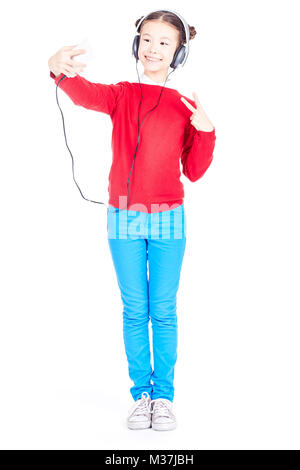 Ragazza asiatica tenendo selfie Foto Stock