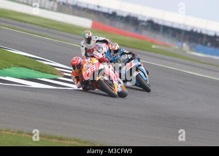 Marc Marquez conduce Jack Miller e Danillo Petrucci durante le qualifiche per la Octo British Gand Prix 2016 Foto Stock