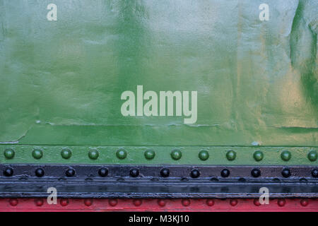 Piastre di metallo con rivetti - locomotore esteriore , ribattuto sfondo in metallo Foto Stock