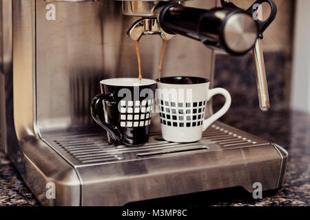 Due tazze di caffè, home macchine per caffè professionali