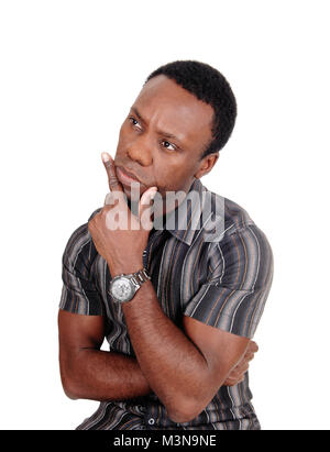 Un primo piano immagine di afro-americano alla ricerca di distanza con una mano sul suo mento, isolato per sfondo bianco Foto Stock