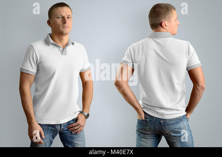 Slim uomo nel white Polo shirt e jeans blu isolato su sfondo grigio, vista anteriore e posteriore. Mockup per il graphic design o logo. Foto Stock