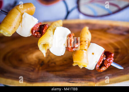 Il dessert. Pesca, melone e formaggio Foto Stock