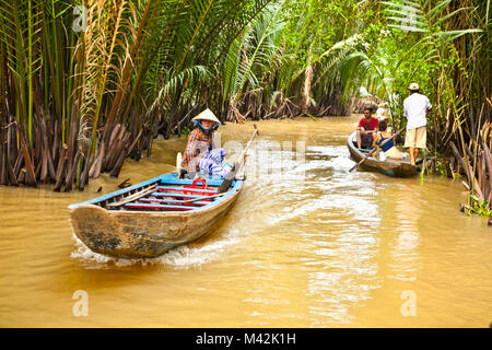 BEN TRE, VIETNAM-NOV 18, 2013: una famosa destinazione turistica è ben tre village il Nov 18, 2013. Nel delta del Mekong, Vietnam. Delta del Mekong è casa di pe Foto Stock