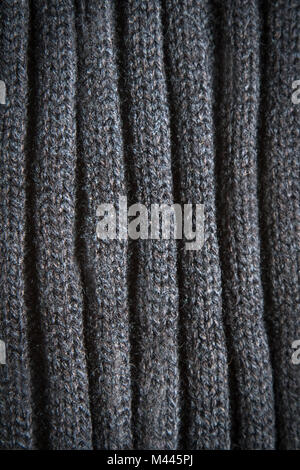 Maglia di lana nero Pattern per chiudere in background fino Foto Stock