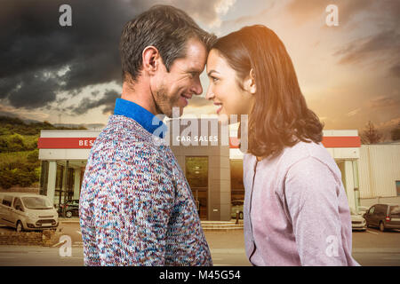 Immagine composita di close-up di giovane in piedi faccia a faccia Foto Stock