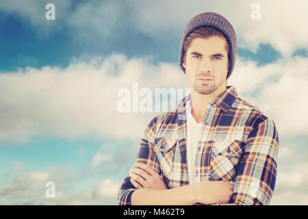 Immagine composita del ritratto di fiduciosa hipster con le braccia incrociate Foto Stock