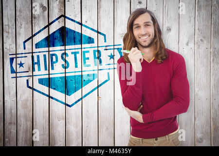 Immagine composita del ritratto di felice hipster tenendo pen Foto Stock