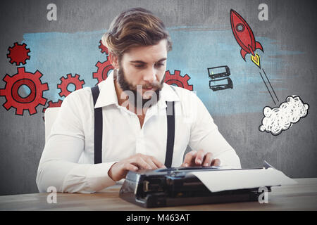 Immagine composita del hipster lavorando su una macchina da scrivere Foto Stock