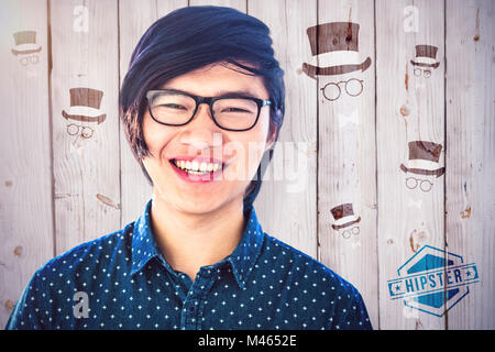 Immagine composita di sorridere hipster imprenditore guardando la fotocamera Foto Stock
