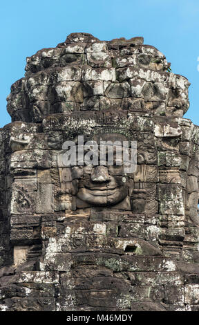 Faccia di pietra di Avalokiteshvara al tempio Bayon, Angkor Thom, Cambogia Foto Stock