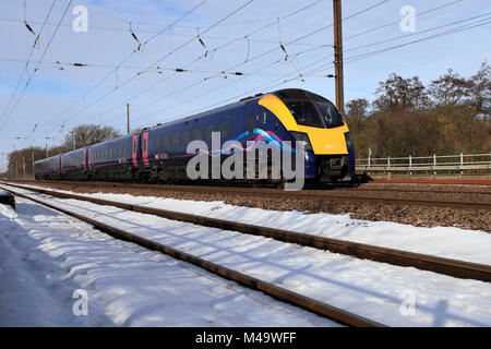 In inverno la neve, 180111 primo scafo treni, East Coast Main Line Railway, Peterborough, CAMBRIDGESHIRE, England, Regno Unito Foto Stock