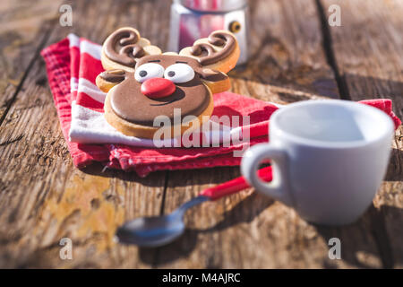 Carino fatti a mano a forma di alce cookies per celebrazioni speciali Foto Stock