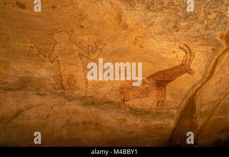 Algeria, Djanet. Parco Nazionale del Tassili n'Ajjer. UNESCO - Sito Patrimonio dell'umanità. Rockpainting preistorico. " Il Dio di Sefar'. Deserto del Sahara. Foto Stock