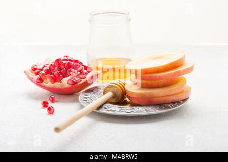 Mele, melograno e miele per Rosh Hashanah Foto Stock