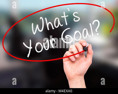 Man mano che scrive che cosa è il vostro obiettivo su schermo visivo Foto Stock