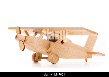 Retrò aereo in legno isolato su sfondo bianco Foto Stock