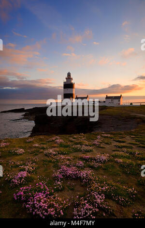 Hook Head Lighthouse sulla punta della penisola di gancio nella Contea di Wexford, Irlanda.Costruito nel XII secolo e una delle più antiche del mondo fari. Foto Stock