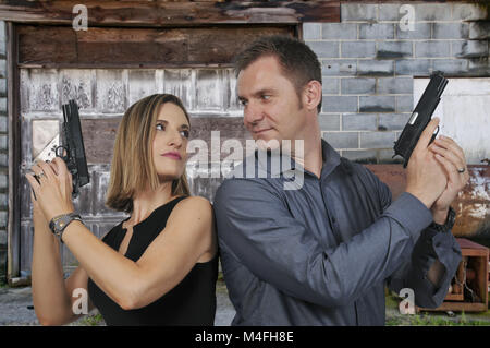 L uomo e la donna delle spie Foto Stock