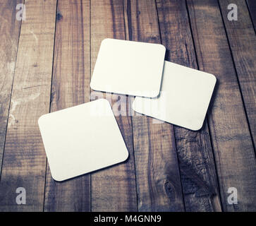 Tre birre coasters Foto Stock