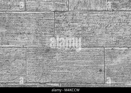 Close-up di pavimentazione in pietra vista dal di sopra in bianco e nero. Foto Stock
