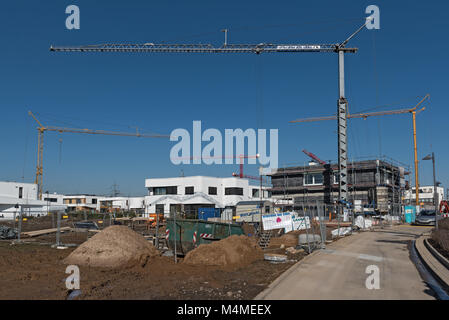 Sito in costruzione di diversi edifici residenziali nel nuovo distretto di Riedberg Foto Stock