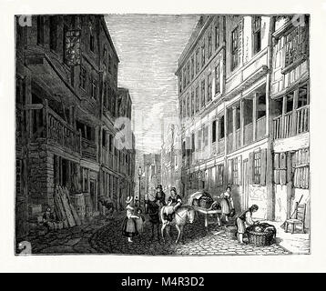 Un vecchio che mostra incisione Watergate Street, Chester. Chester è una città murata nel Cheshire, Inghilterra, sul fiume Dee, vicino al confine con il Galles. La strada contiene 'File'. Chester le righe sono costituiti da passaggi coperti al primo piano dietro la quale sono ingressi di negozi e altri locali. Al livello della strada si trova un altro, livello inferiore di negozi e altri locali commerciali Foto Stock