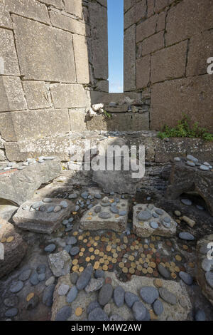 Offerte di religiosi in sette chiese, Inishmore, Isole Aran, nella contea di Galway, Irlanda. Foto Stock