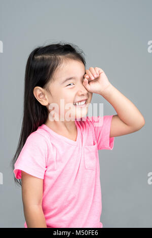 Felice ragazza asiatica sorriso sul suo viso Foto Stock