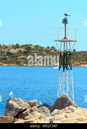 Seagull sul faro a luce rotante. Foto Stock