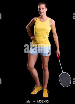 Giovane donna badminton player isolato Foto Stock