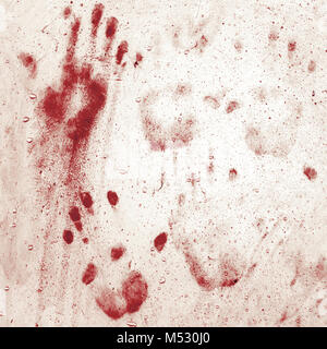 Bloody handprints sulla parete Foto Stock