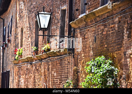 Via del centro storico di Pienza in Toscana Foto Stock