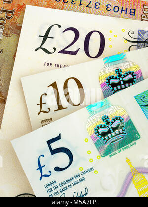 Sterling carta moneta - nuovo problema £20, £10, £5 pound note close up Foto Stock