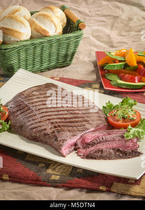 Fiancheggiano bistecca per cena Foto Stock