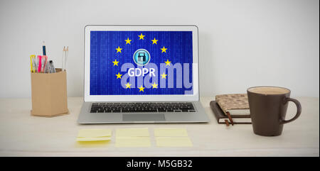 Immagine composita di laptop e vari accessori per ufficio su tavola Foto Stock