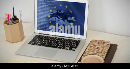 Immagine composita di laptop e vari accessori per ufficio su tavola Foto Stock