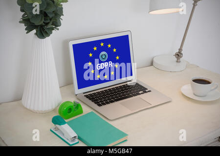 Immagine composita di notebook e accessori per ufficio su tavola Foto Stock