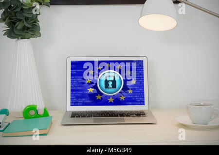 Immagine composita di laptop e vari accessori per ufficio su tavola Foto Stock